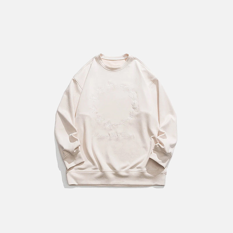 Front view of the beige Loose Embroidered Sweatshirt in a gray background