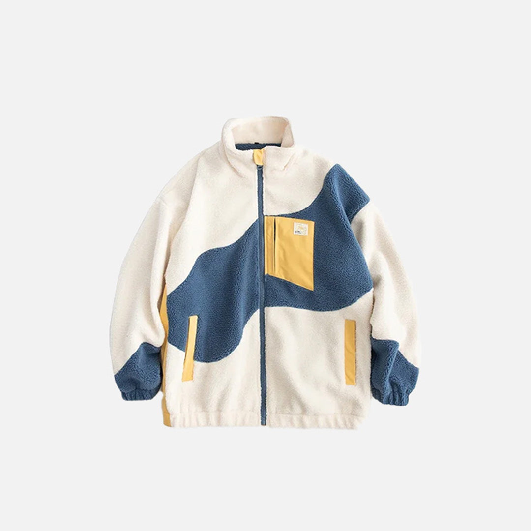 Front view of the beige Furry Fleece Patchwork Jacket in a gray background