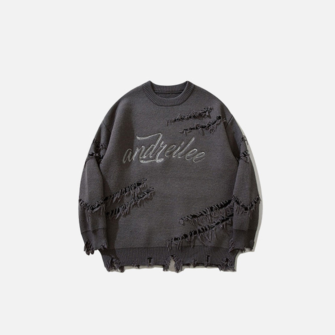 Front view of the grey Ripped Artisan Sweater in a gray background