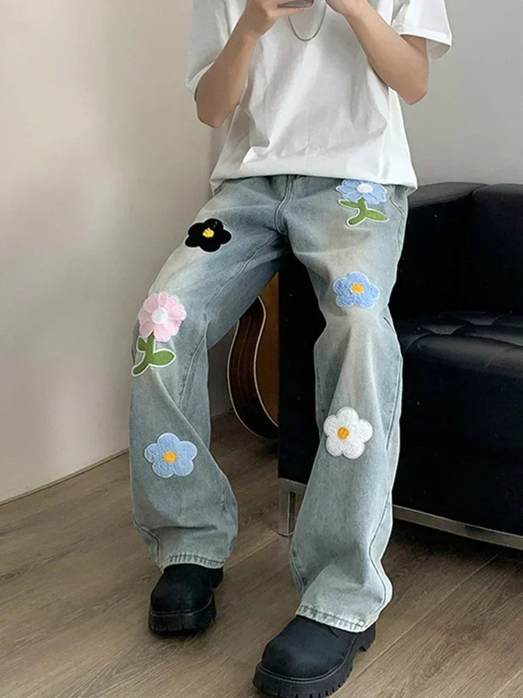 Model wearing the blue Retro Flower Embroidered Jeans