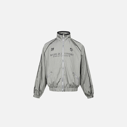 Front view of the gray Edge Runner Windbreaker Jacket in a gray background