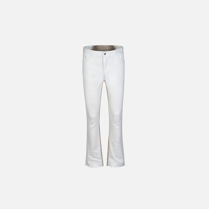 Front view of the white Dual-Tone Wave Flare Jeans in a gray background