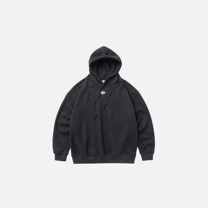 Front view of the navy blue Zen Mod Hoodie in a gray background