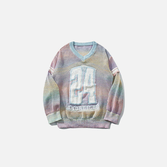 Front view of the pink Sporty Knitted Sweater in a gray background