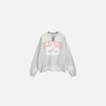 Front vew of the gray Black Star 23 Sweater in a gray background