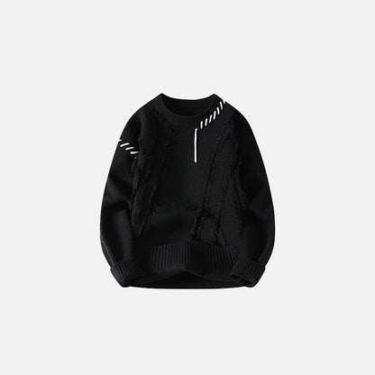 Front view of the black Ripped Stitch Sweater in a gray background