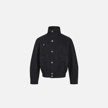 Front view of the black Classic High-Collar Utility Jacket in a gray background