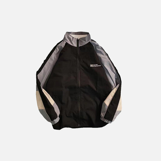 black color of the Patchwork Color Block Thin Jacket in a gray background 