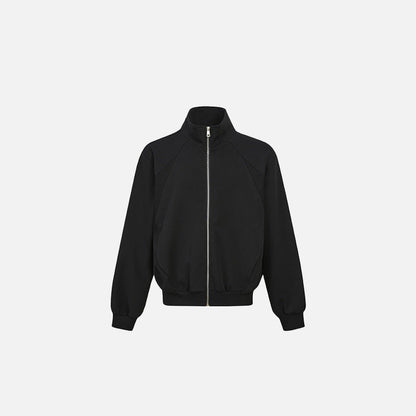 Front view of the black Zenith Zip-Up Jacket in a gray background