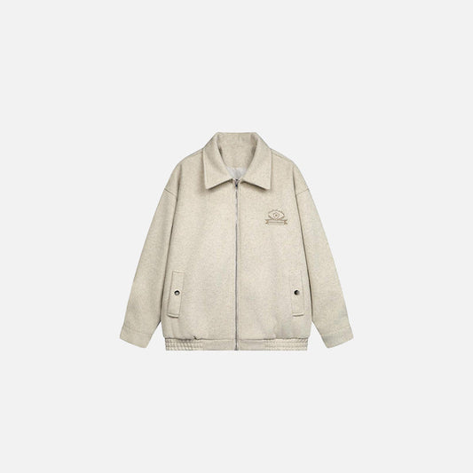 Front view of the apricot Classic Zip-Up Jacket in a gray background