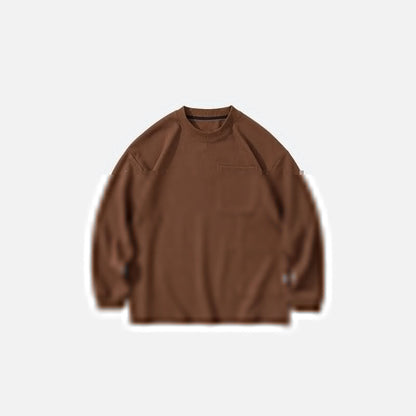 Front view of the brown Timeless Pocket Sweatshirt in a gray background