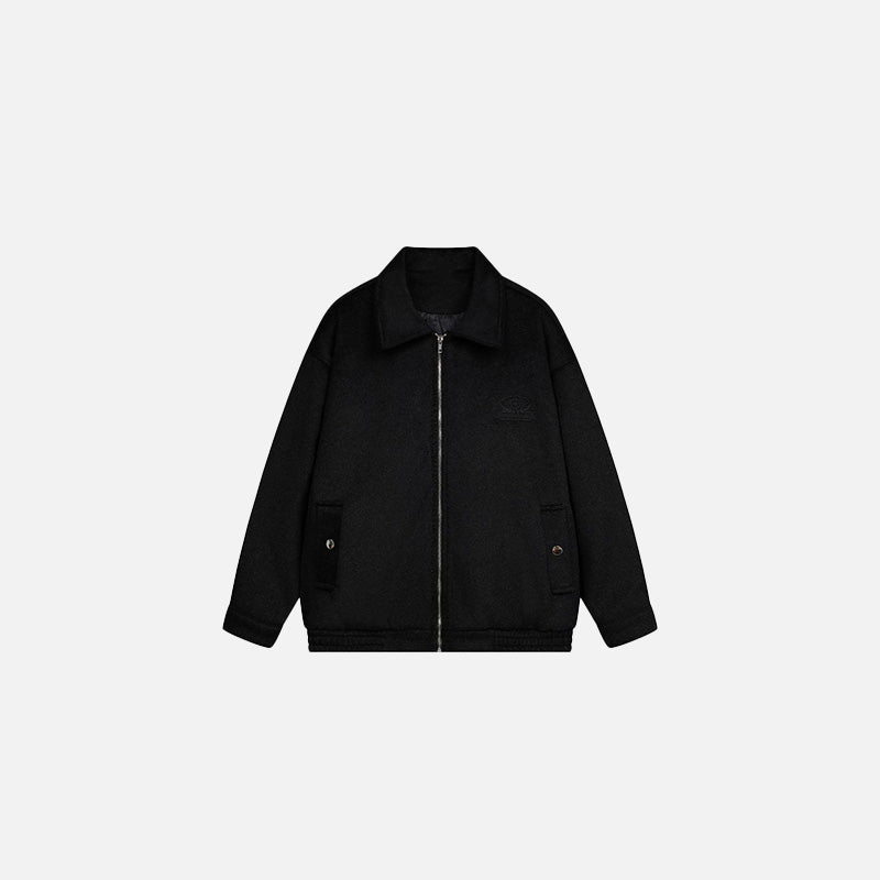 Front view of the black Classic Zip-Up Jacket in a gray background