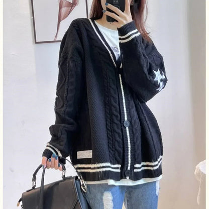 Model wearing the black Vintage Cable-Knit Sweater